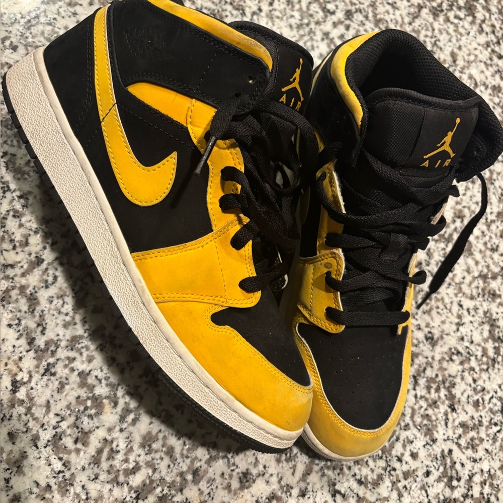 Air Jordan 1 Black and Yellow High-Top Sneakers